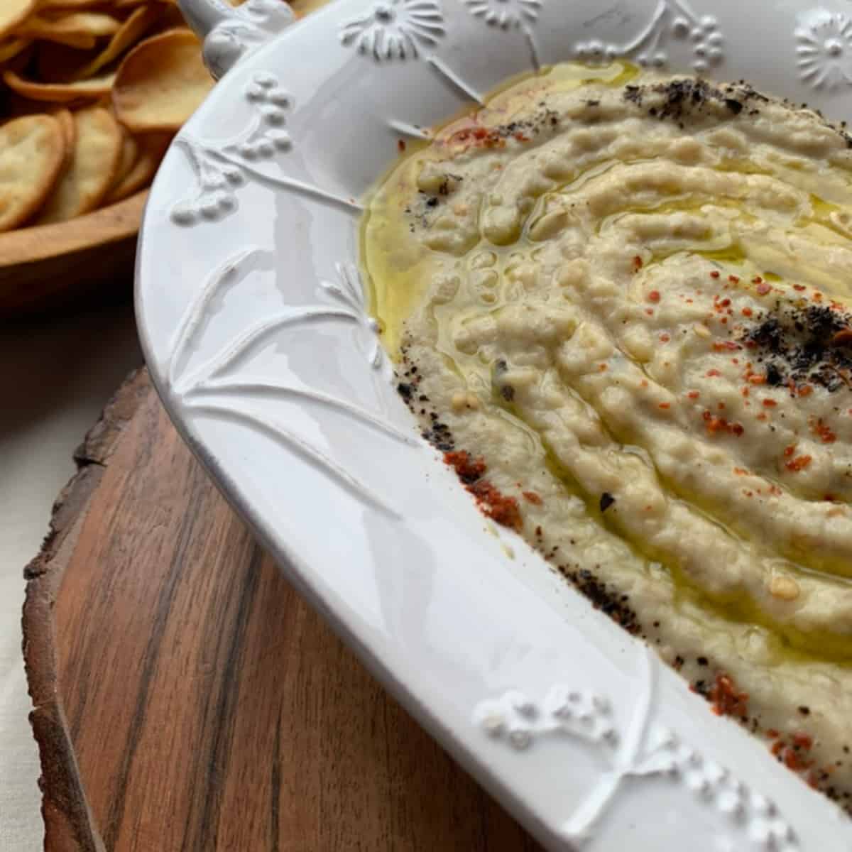 Mutabal with pita chips.