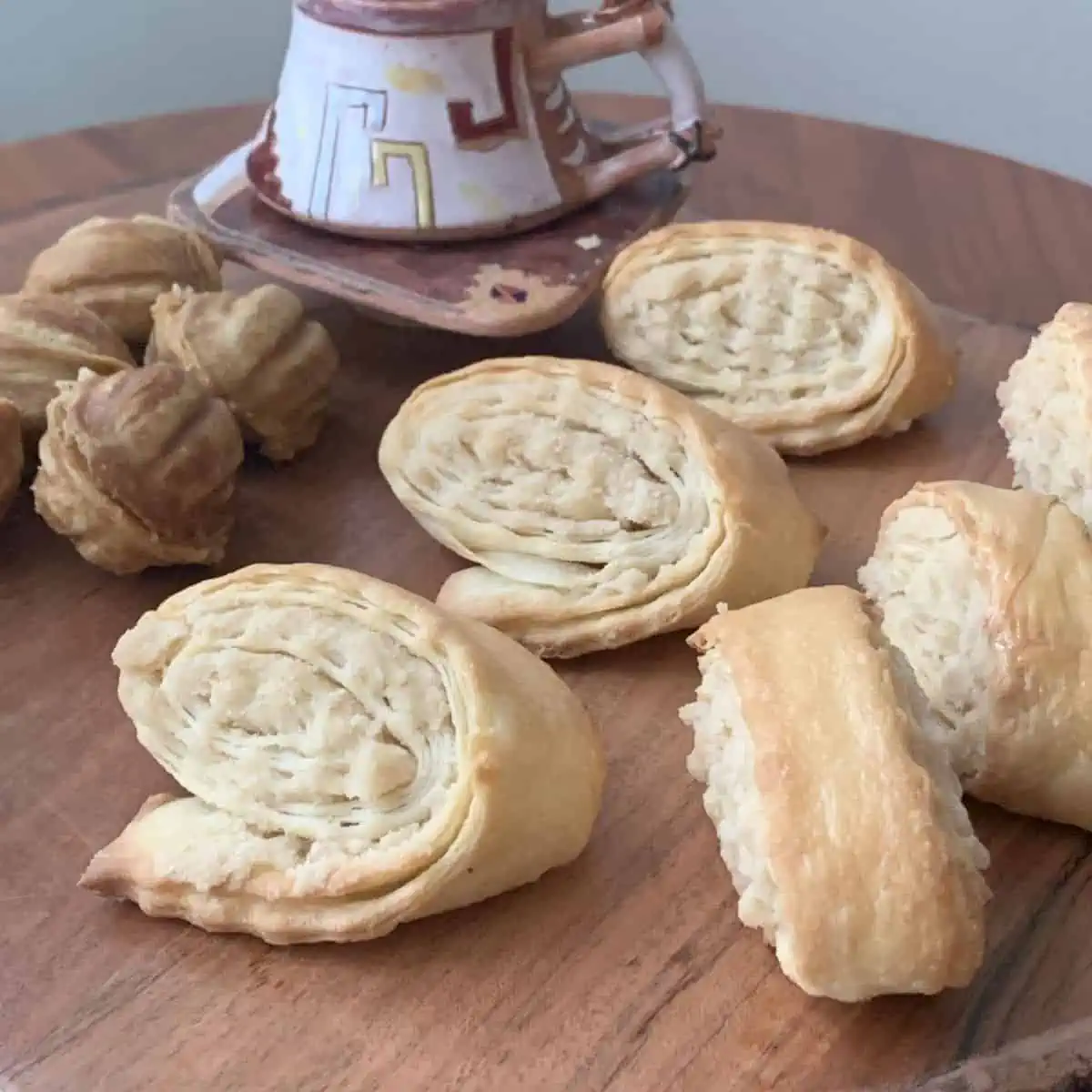 Gaga and a cup of coffee on a wooden table.