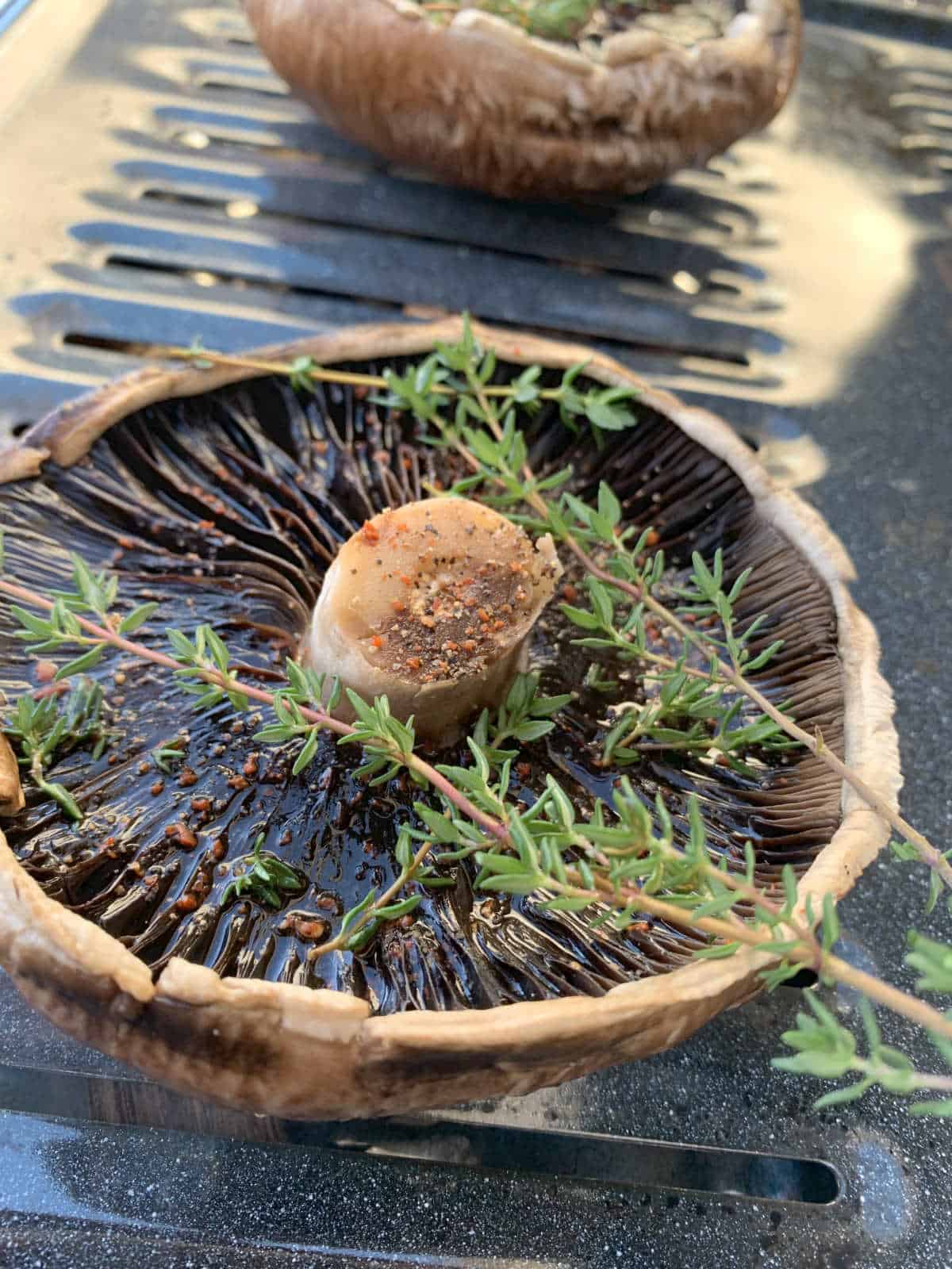Mushrooms on a broiling pan.