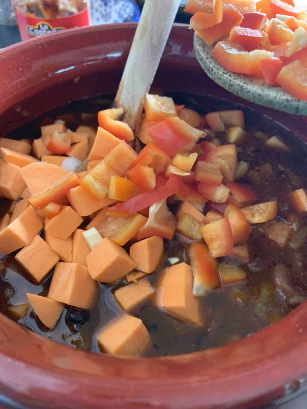Three bean chili-step-by-step, sautéing the vegetable.