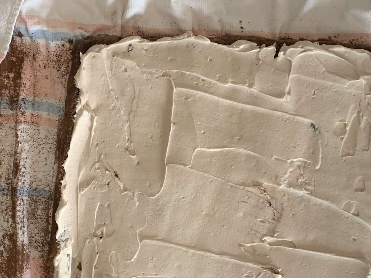 Spreading tiramisu buttercream.