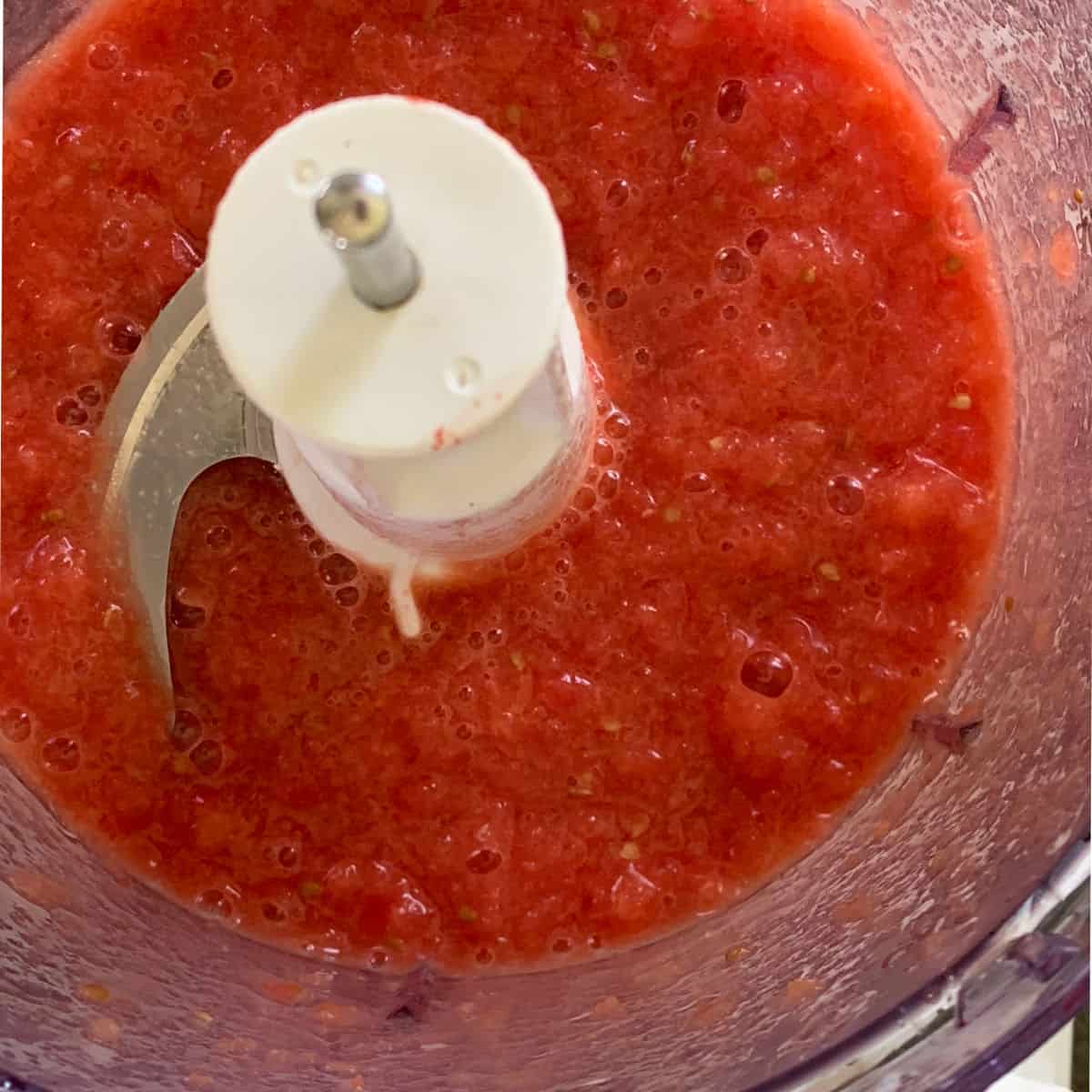 Processed tomatoes in a food processor.