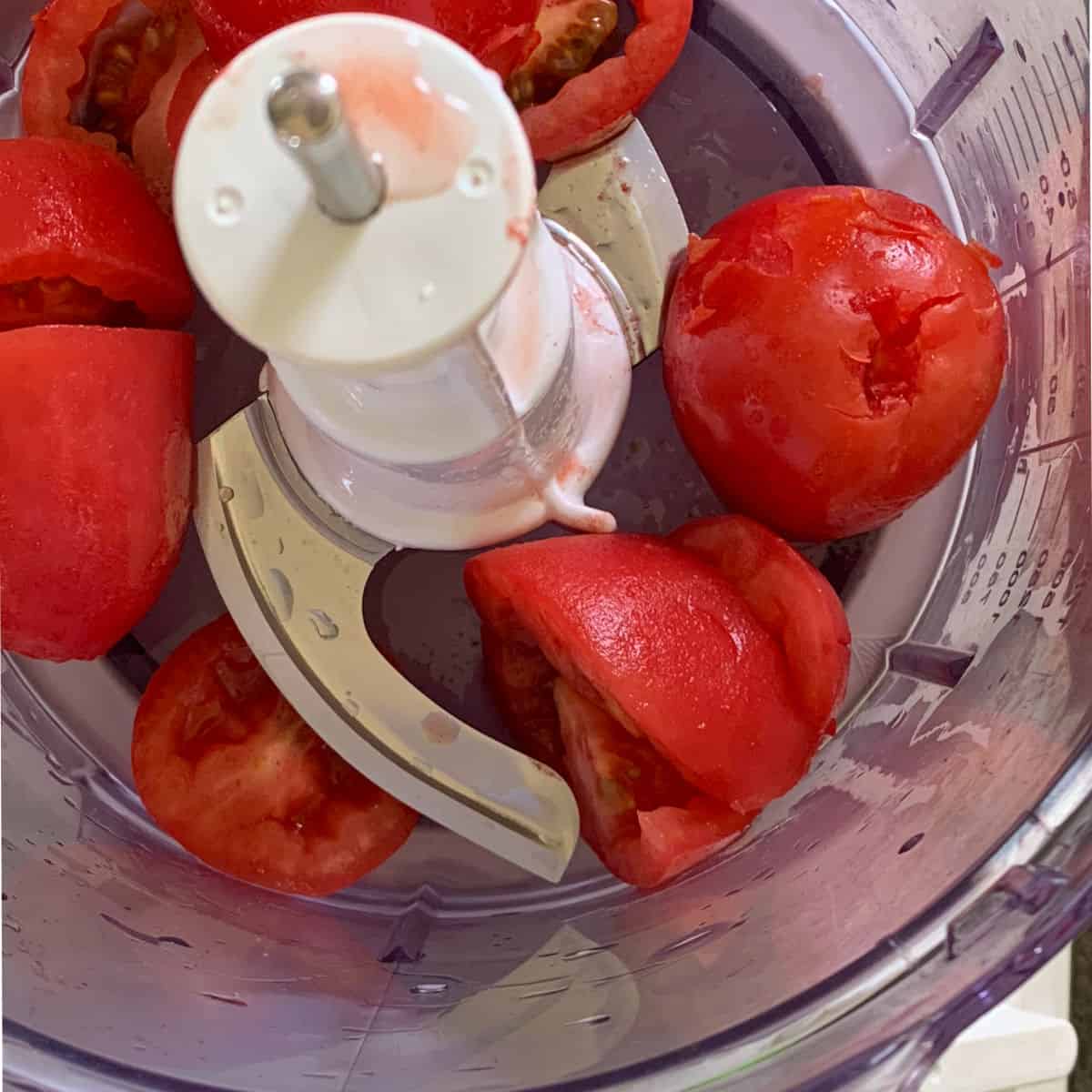 Tomatoes in a food processor.