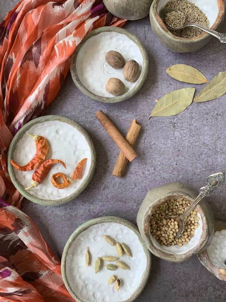 Spices in the little plates.