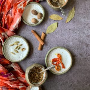 Spices in the little plates.