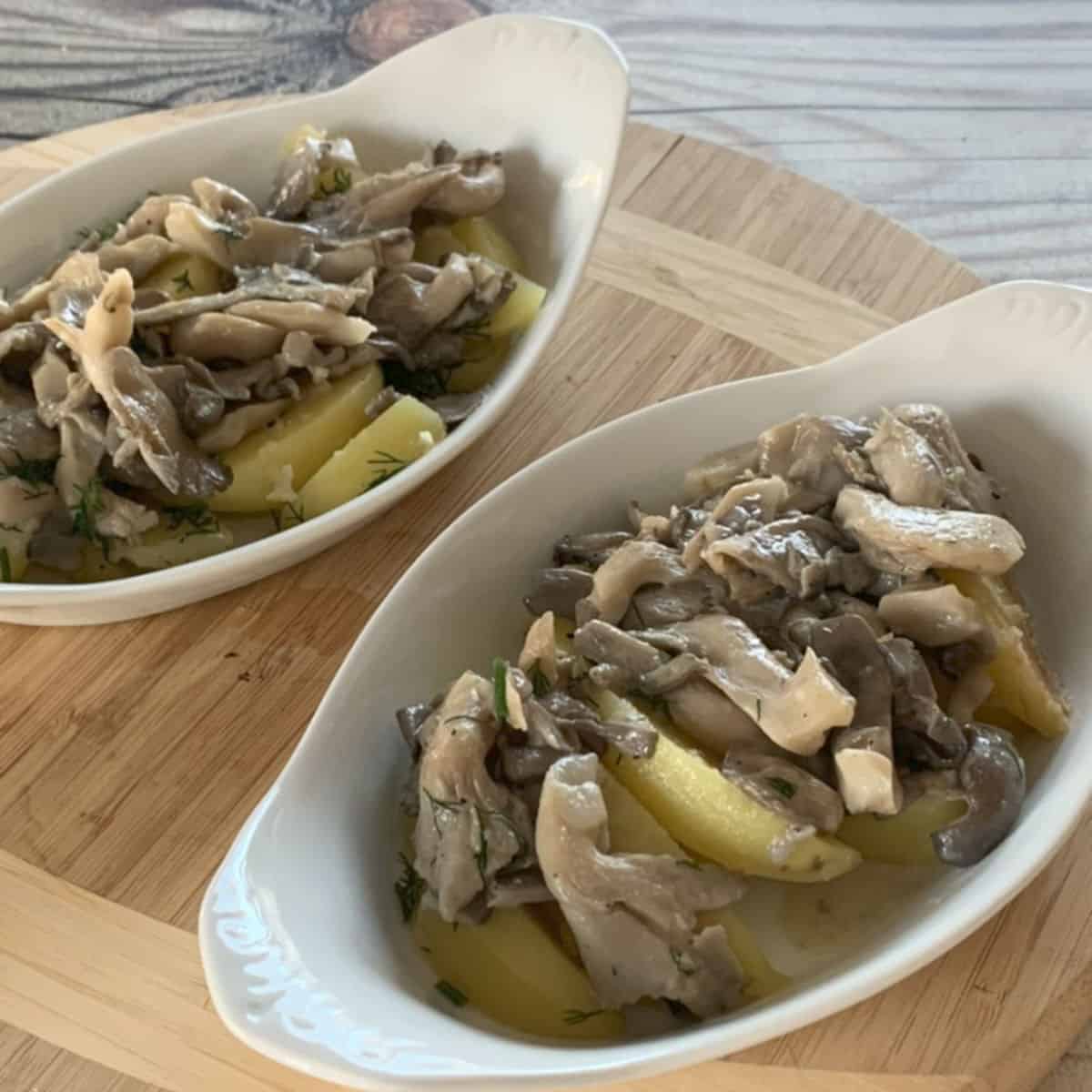 Oyster Mushroom and Potatoes in Gratin dish ready to bake.