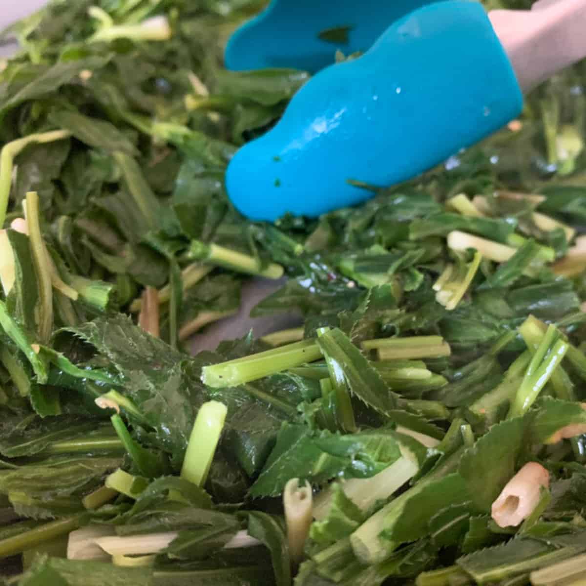 Sautéing sibekh with butter.