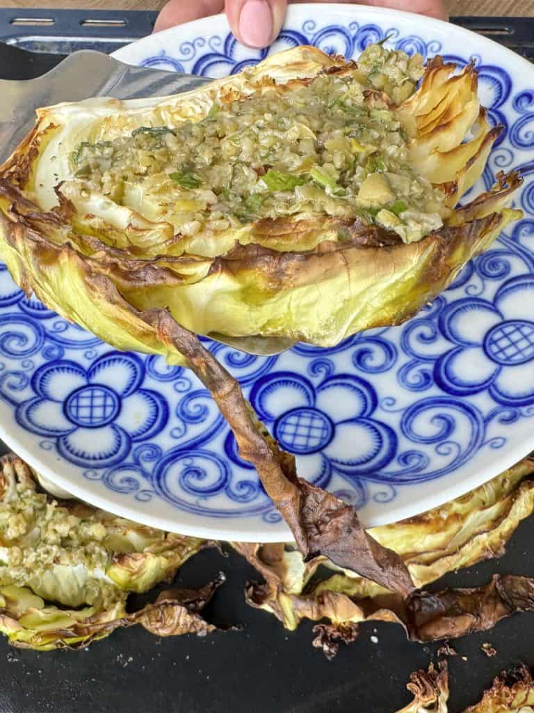 Serving crispy roasted cabbage.