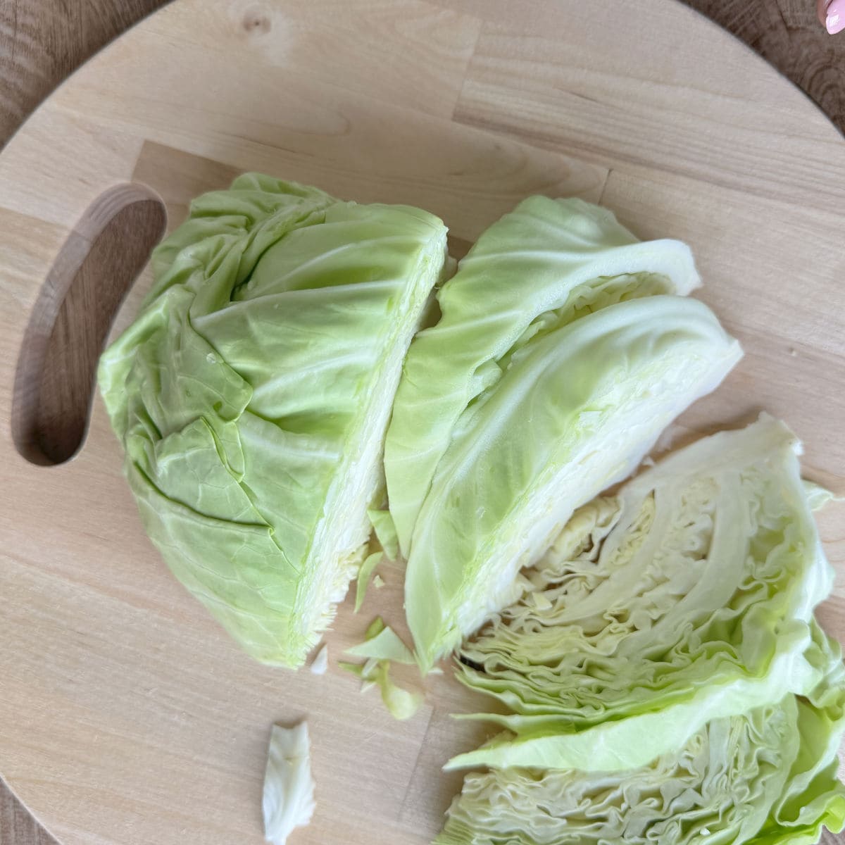 Cutting the young cabbage.
