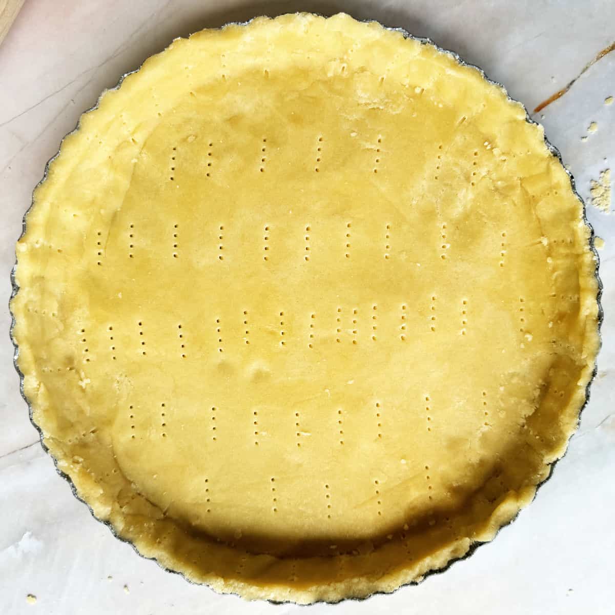 Making the circle tart crust sheet.