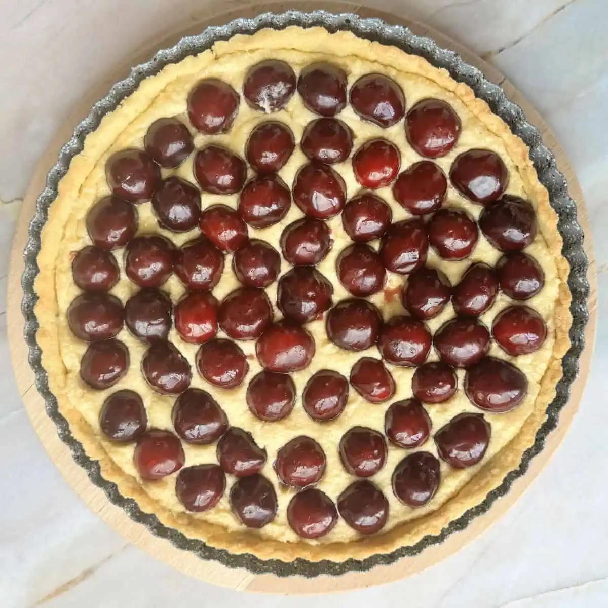Fresh cherries in a tart.