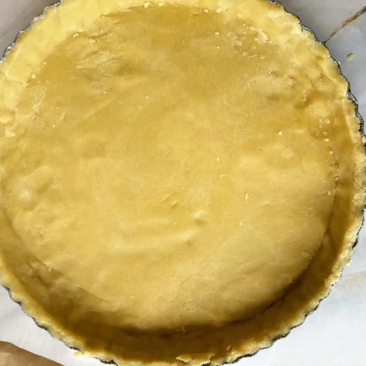 Making the circle tart crust sheet.