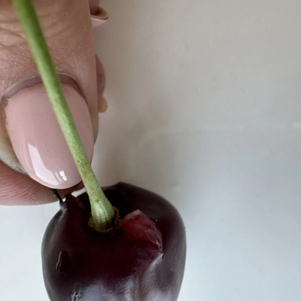 Pitting the cherry with a hair pin.