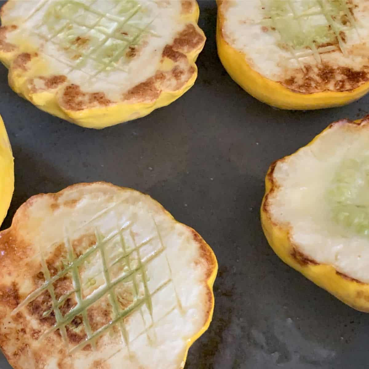 Frying pattypan zucchini.