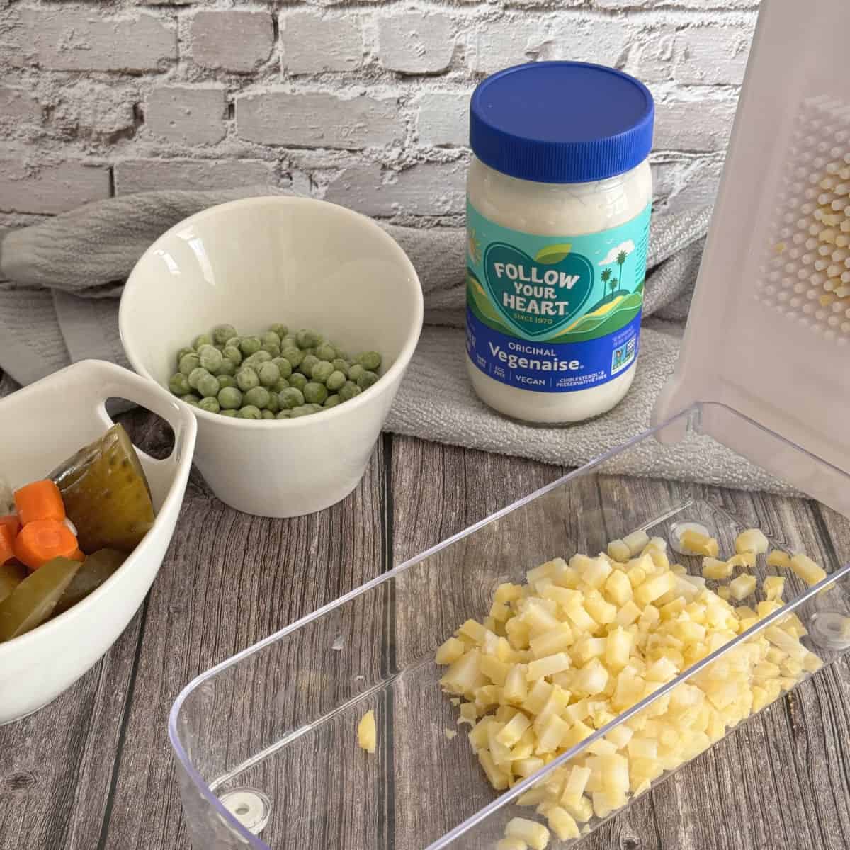 Chopping potatoes for olivier salad.
