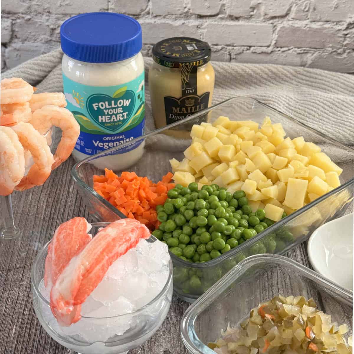 Combining chopped vegetables together.