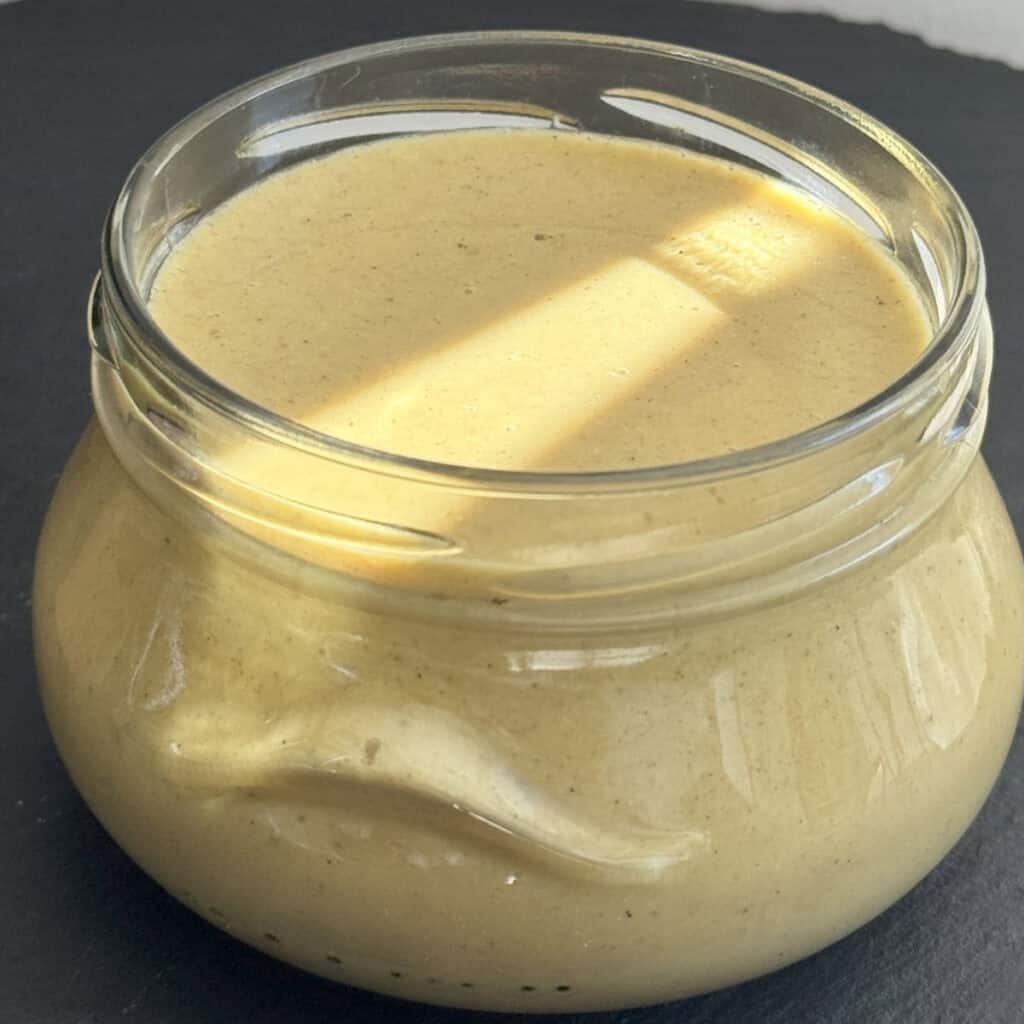 Spicy mustard in a jar.