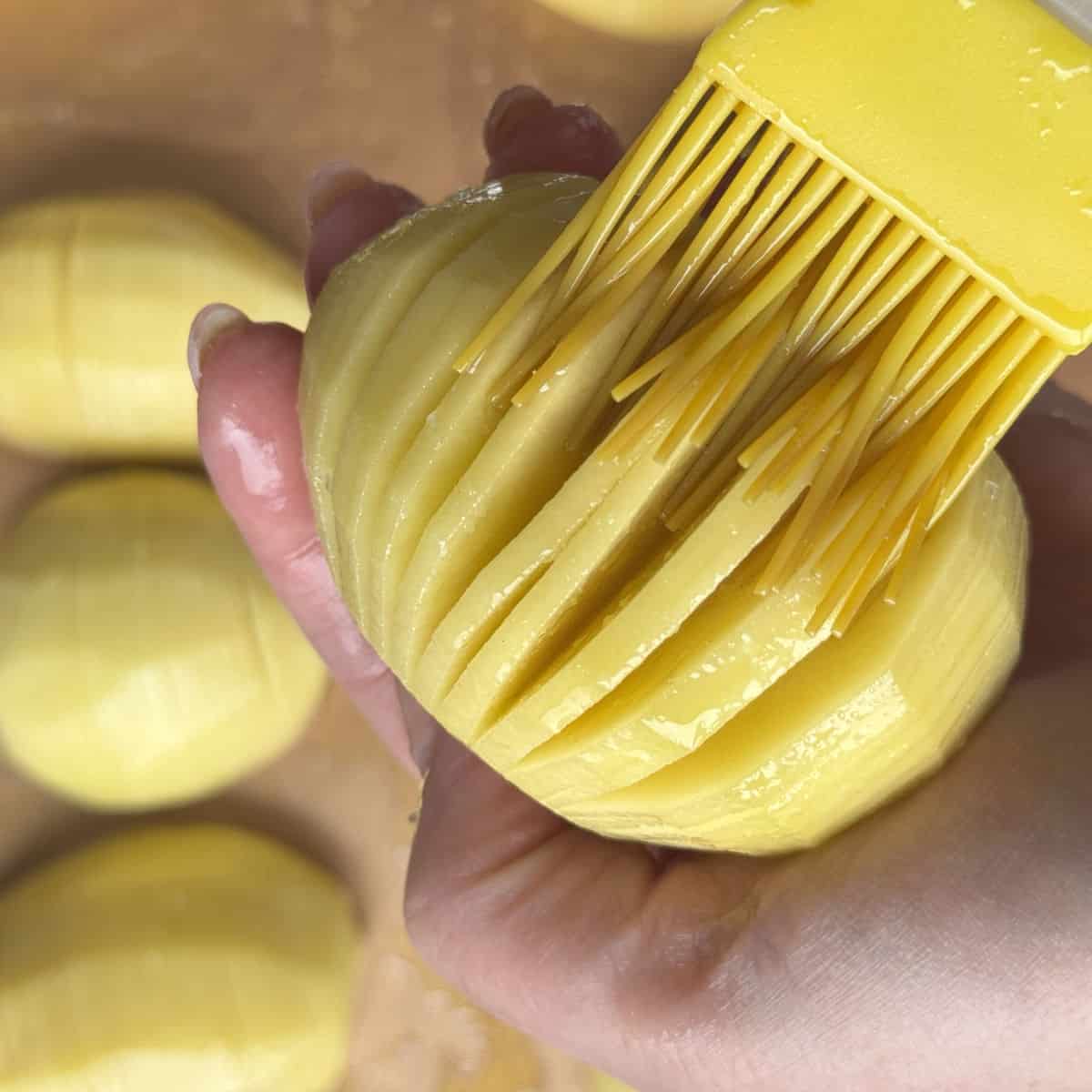 Brushing oil and salt.