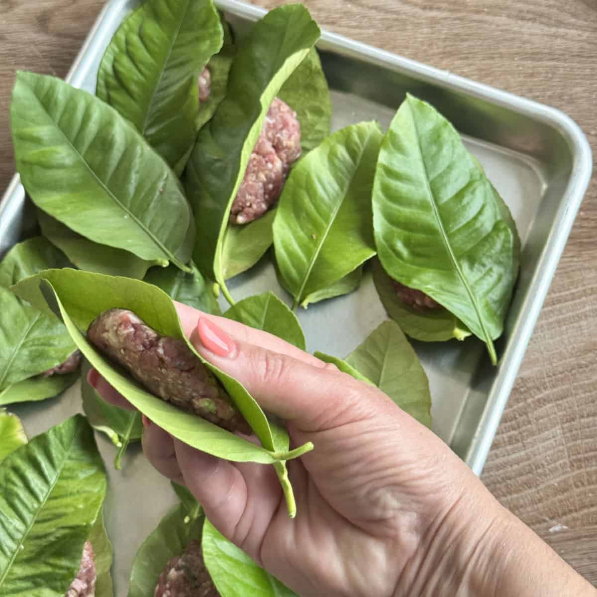 Meat is sandwiched between the leaves.
