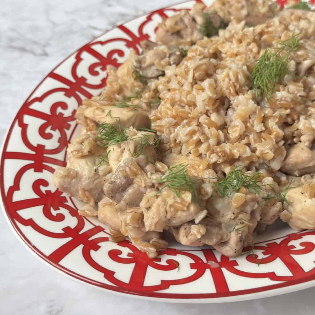 Farro pilaf with chicken from the side view.