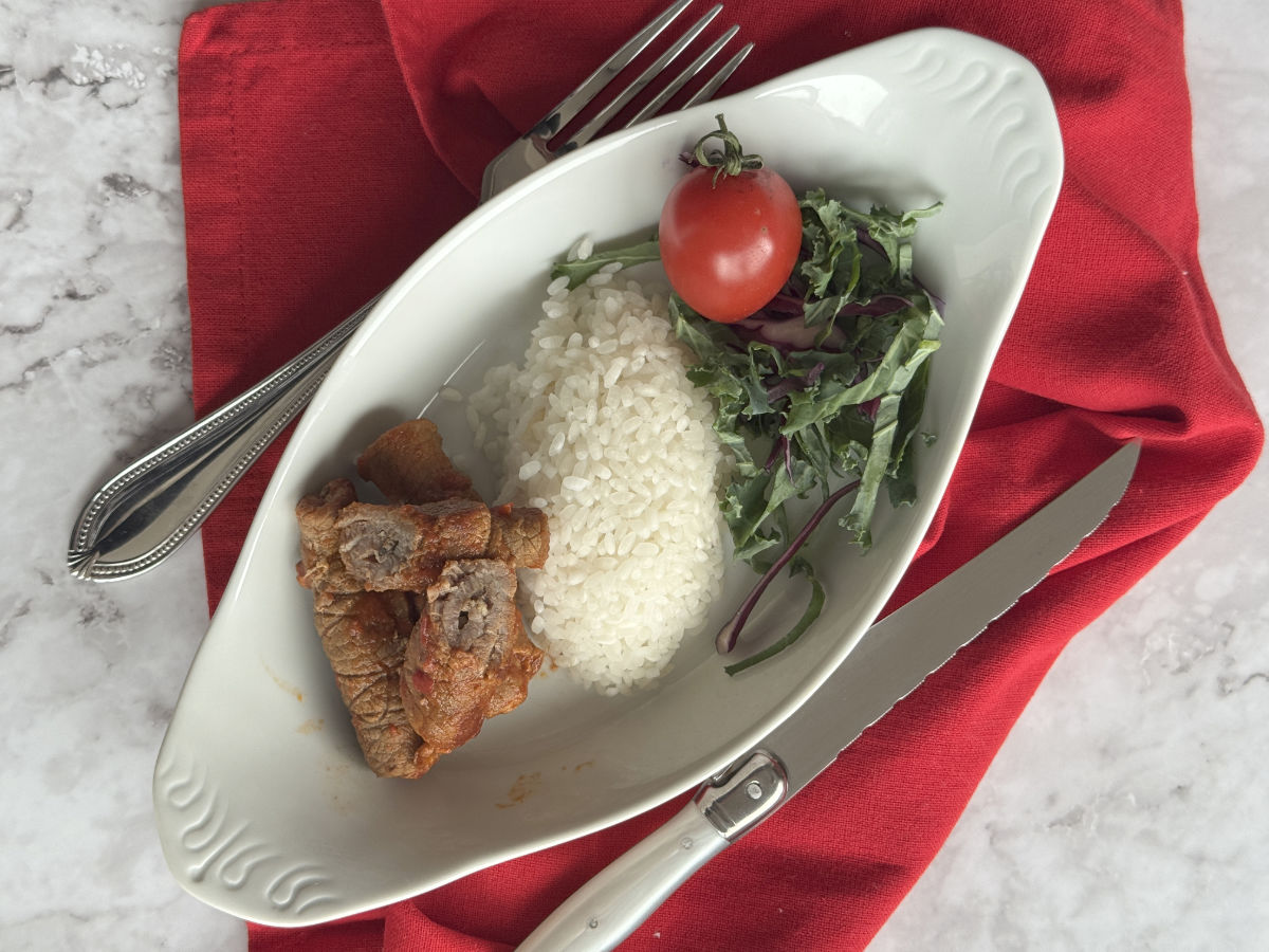 Armenian Roasto served with pilaf and greens.