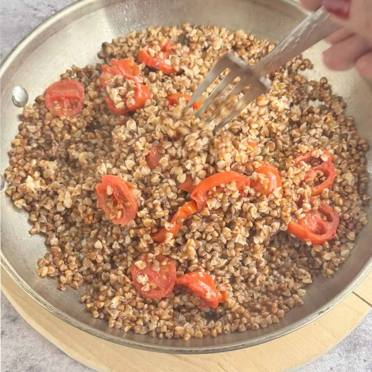 Fluffing the buckwheat pilaf
