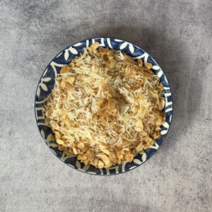 verhead view of Armenian rice pilaf with vermicelli topped with toasted almonds.