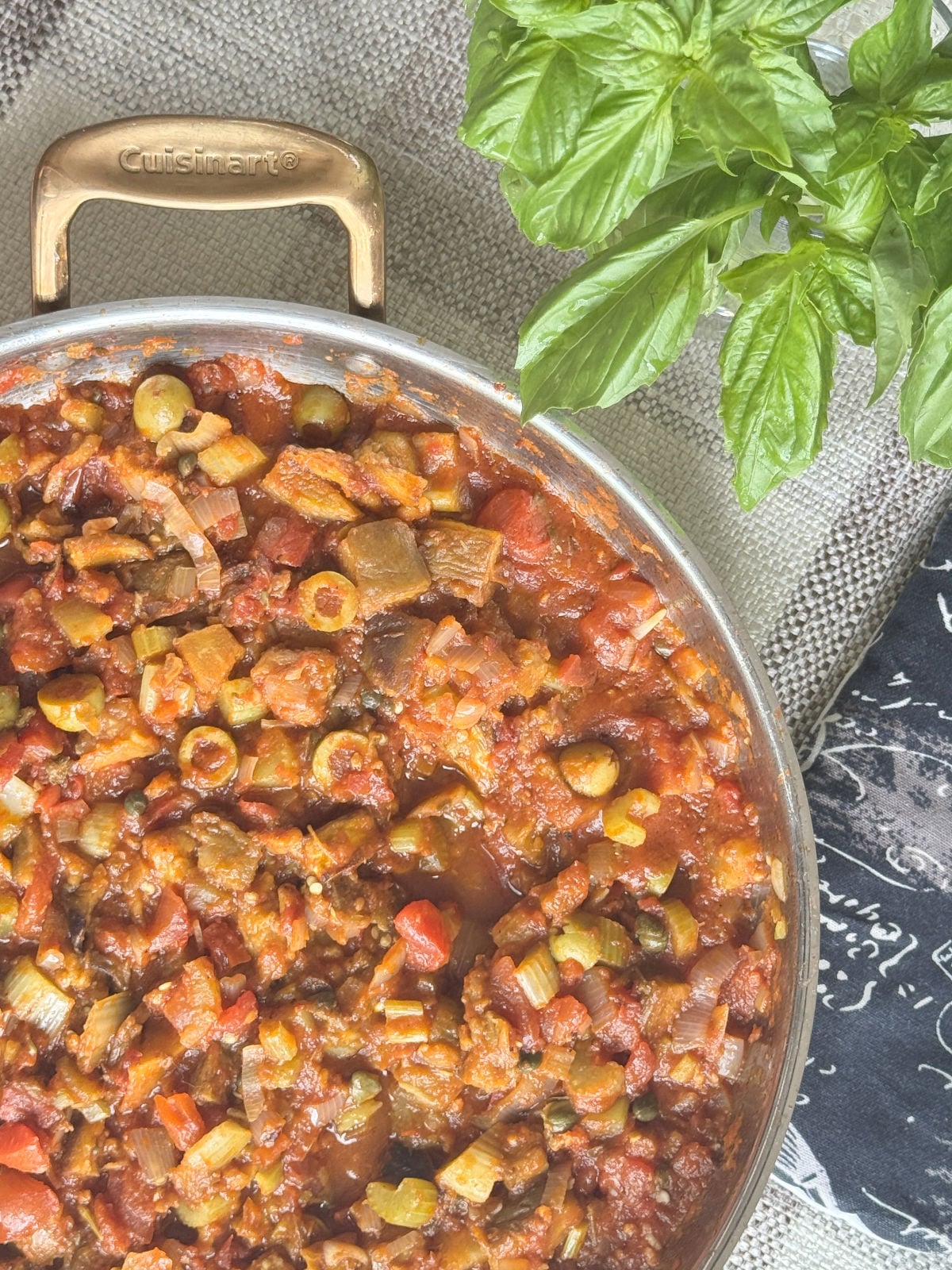 A flat-lay composition featuring finished Sicilian caponata.
