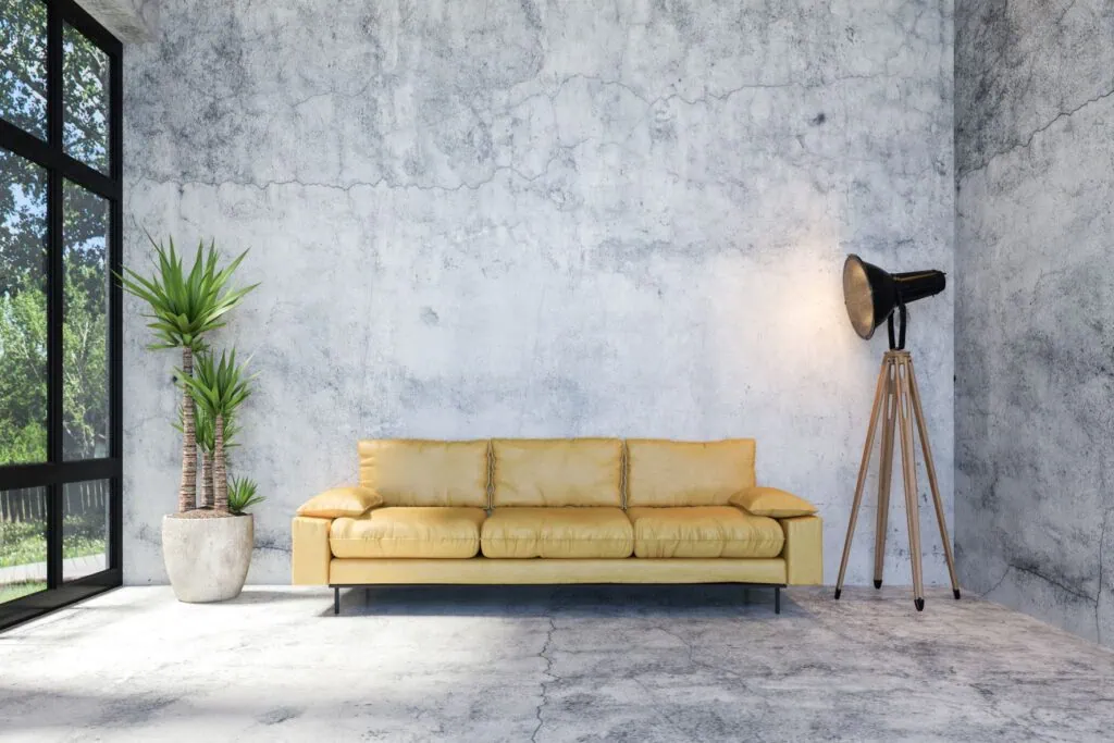 sofa with indirect lighting from a large window wall