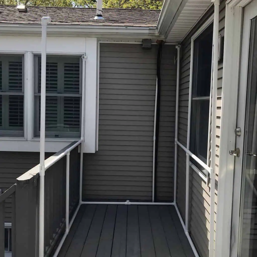PVC pipe frame for the beginning of a catio outdoor enclosure on a deck