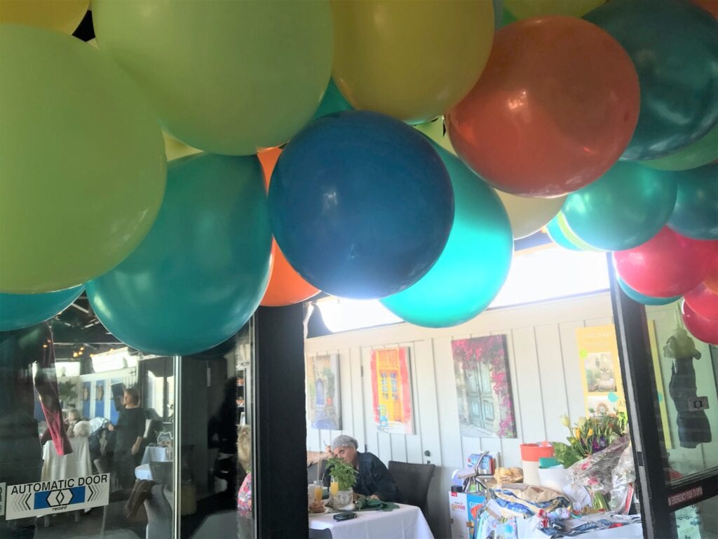 Balloon arch for a garden themed baby shower