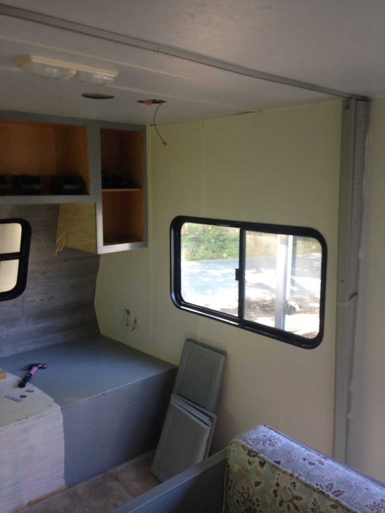 Camper remodel before and after in progress
