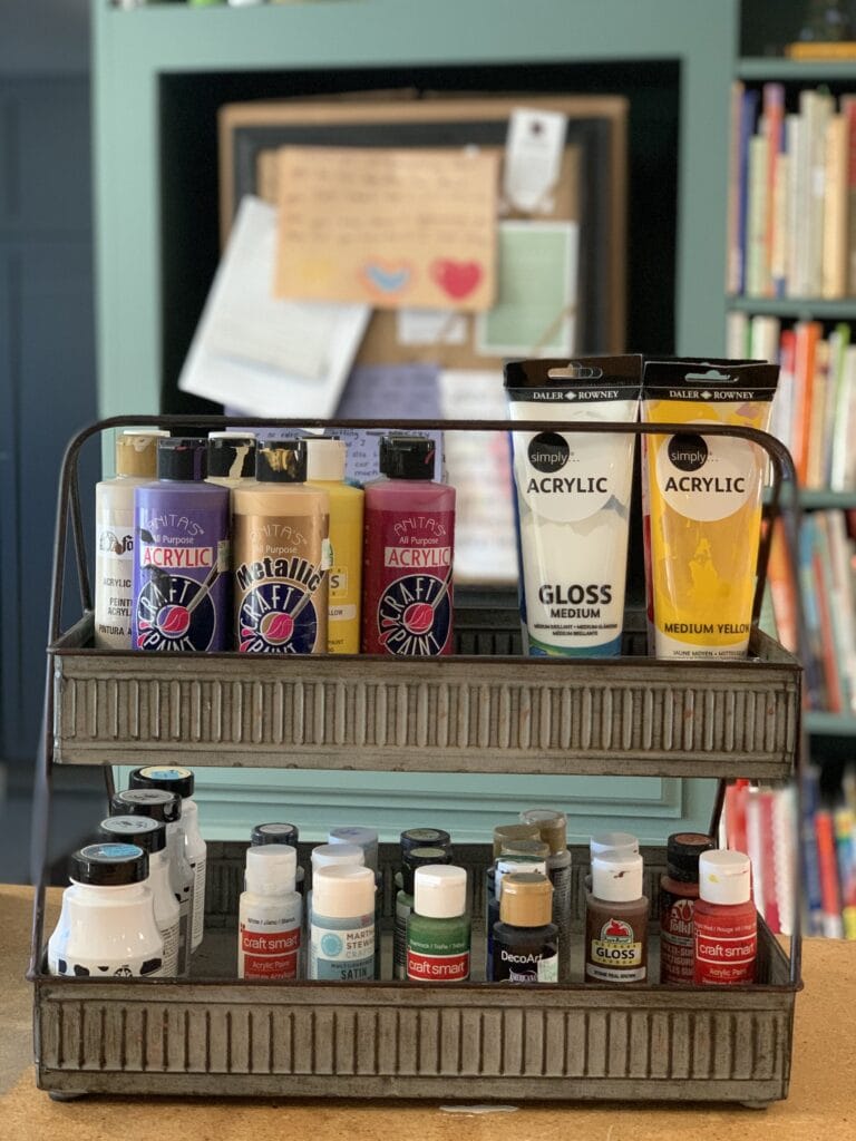 tiered tray holding craft paint