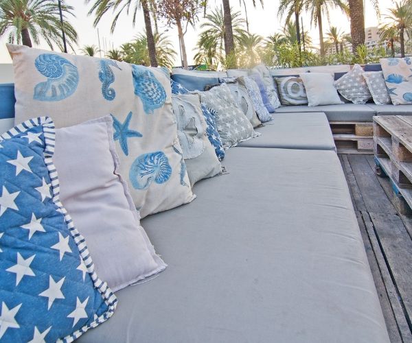 outdoor decorating with lots of pillows