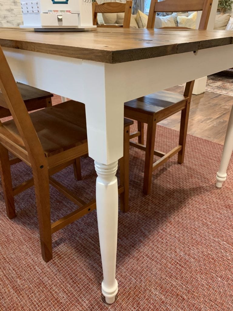 How to finish a pine farmhouse table.  close up of painted legs