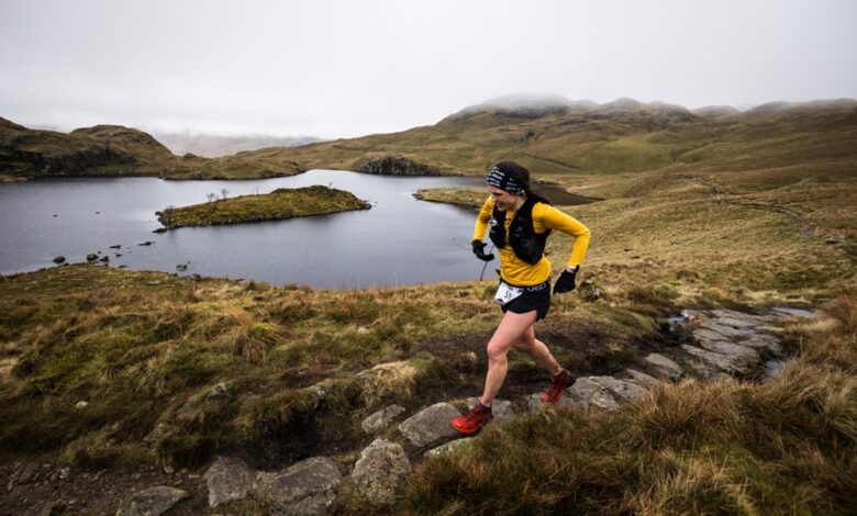 Katie Kaars Sijpesteijn strides through Patterdale during the 2023 SILVA Lakes Traverse. Credit: No Limits Photography