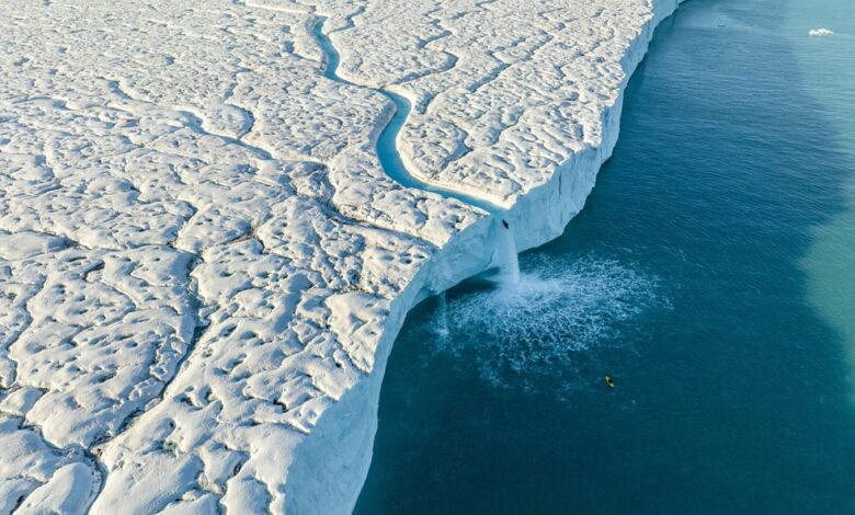 Aniol Serrasolses paddles the river on the Austfonna ice cap, Svalbard on August 6, 202. Credit: David Sodomka / Red Bull Content Pool