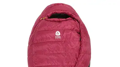 Warm red and black sleeping bag with Sierra Designs logo, ideal for outdoor camping and hiking.