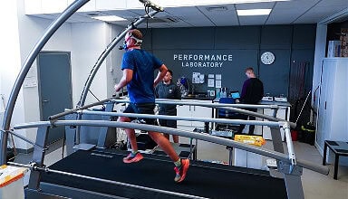 Athlete running on a treadmill in a performance laboratory at Loughborough University.