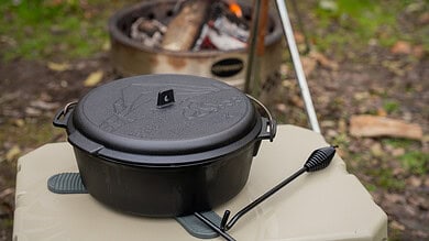 Outdoor Insight cast iron cooking pot for camping and outdoor adventures.