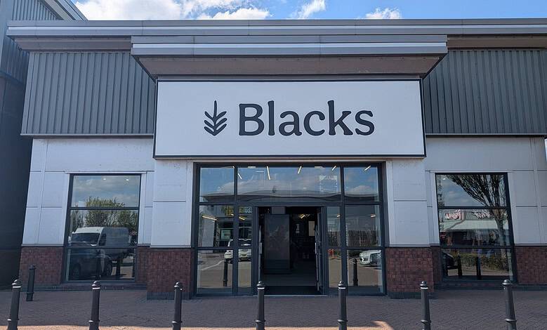 Exterior view of Blacks outdoor retail store showcasing outdoor gear and apparel.