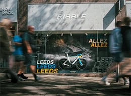 Modern Ribble bike shop storefront with outdoor signage and bike display in Leeds, UK.