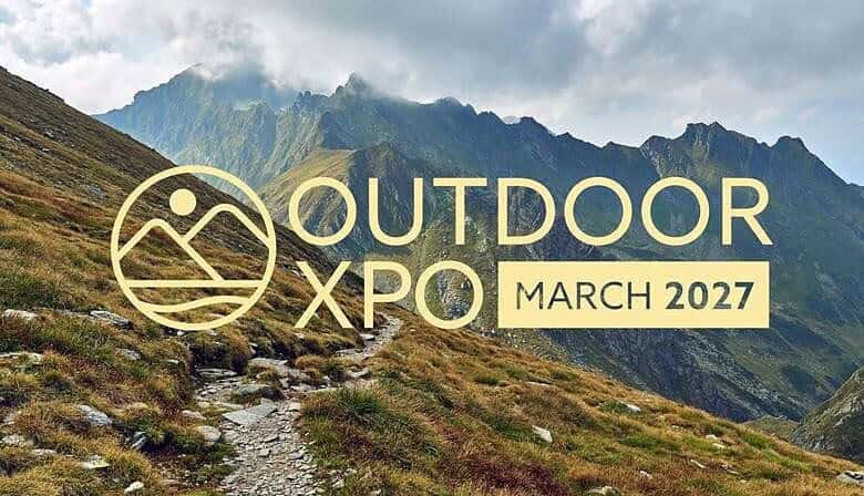 Scenic mountain trail in lush green landscape during outdoor event in March 2027.