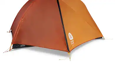 Orange lightweight camping tent for outdoor adventures and hiking trips.
