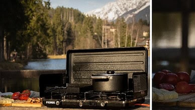 Two-burner stove for van-life and camping from Primus in outdoor setting.