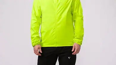 Bright neon yellow women's running jacket with hood, lightweight and waterproof.