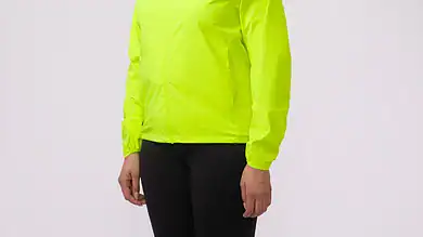 Neon yellow women's running jacket for outdoor activities and running.