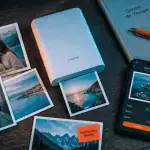 imprimante smartphone sur bureau avec photos tirées