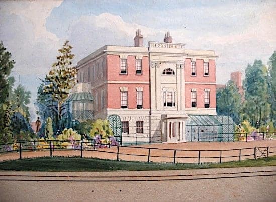Historic pink mansion with glass conservatories and lush gardens.