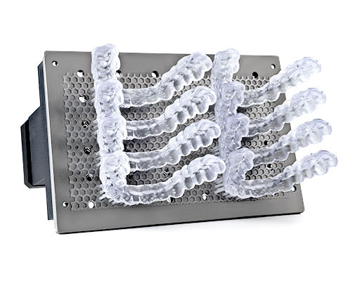 Eight clear dental splints printed on the PRO 20’s build platform using RS Crystal Polish